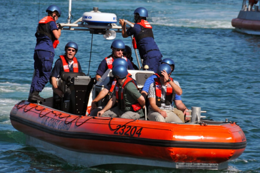 BENS members riding watercraft with US Coast Guard