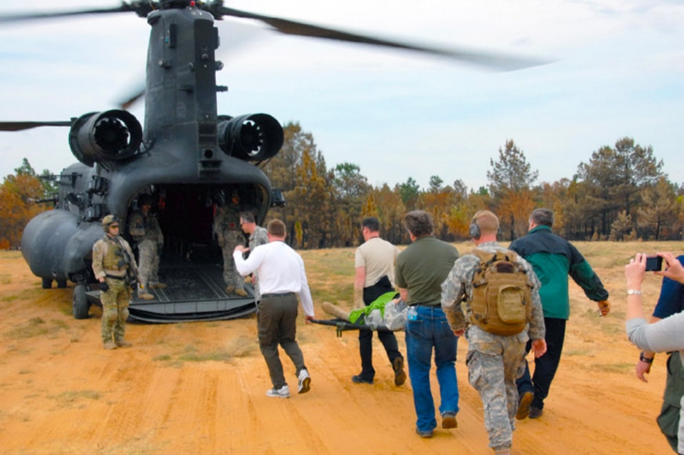 BENS members board helicopter during training exercise