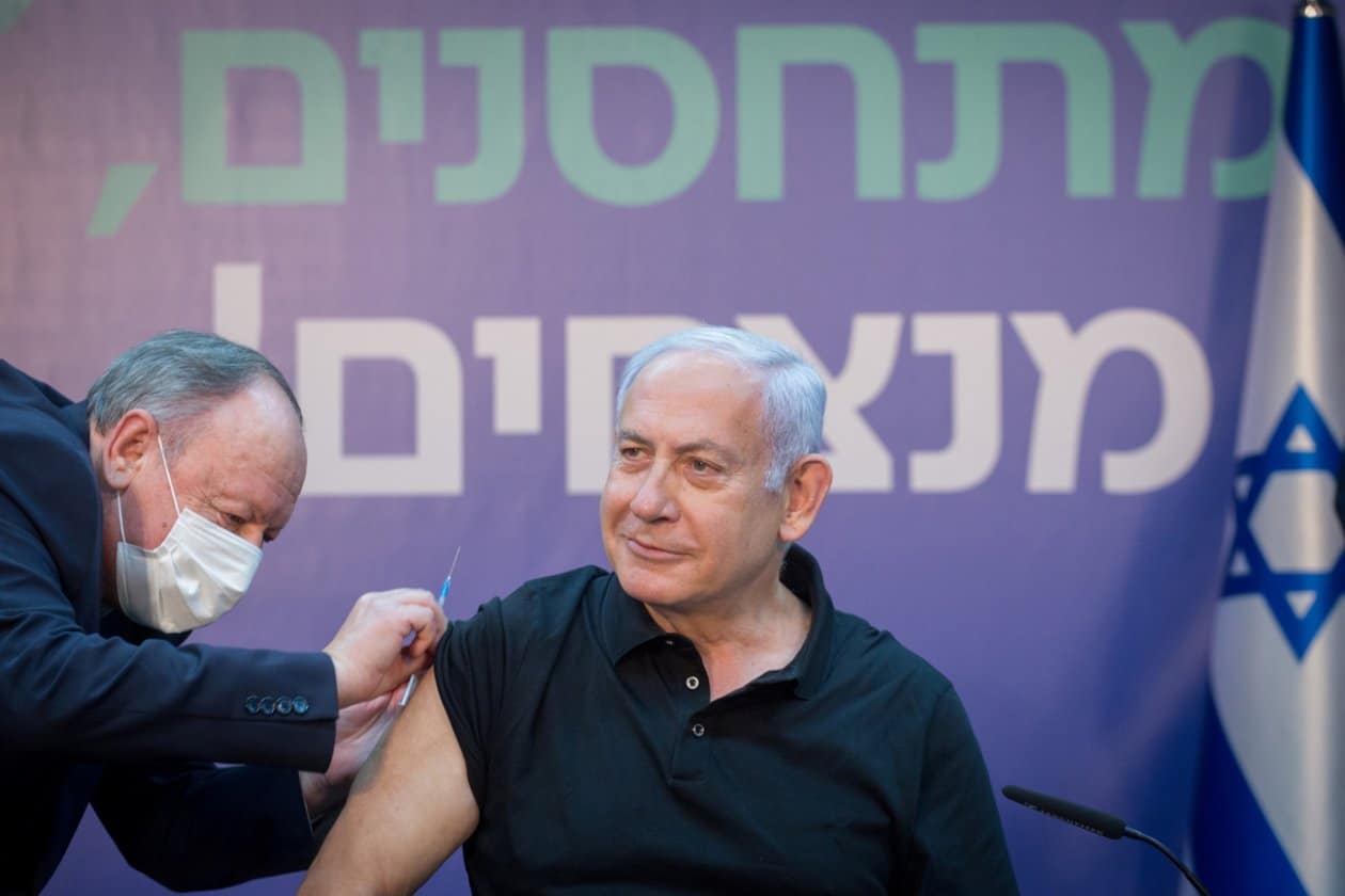 Israeli PM Netanyahu receives a vaccination shot