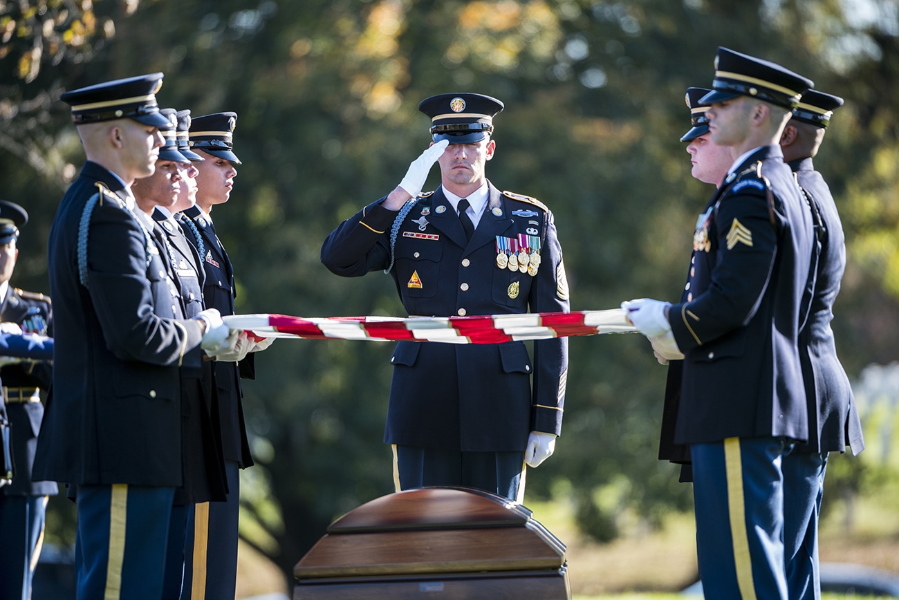 The U.S. Army Honor Guard, The 3d U.S. Infantry Regiment (The Old Guard) Caisson Platoon, and The U.S. Army Band, “Pershing’s Own”, conduct the funeral of U.S. Army Staff Sgt. Bryan Black in Section 60 of Arlington National Cemetery, Arlington, Virginia, Oct. 30, 2017.  Black, a native of Puyallup, Washington, was assigned to Company A, 2nd Battalion, 3rd Special Forces Group (Airborne) on Fort Bragg, North Carolina when he died from wounds sustained during enemy contact in the country of Niger in West Africa, Oct. 4, 2017.  Ryan McCarthy, acting secretary, U.S. Army; Gen. Mark Milley, chief of staff, U.S. Army; and Karen Durham-Aguilera, executive director, Army National Military Cemeteries; were in attendance and gave condolences to the Black Family at the gravesite. (U.S. Army photo by Elizabeth Fraser / Arlington National Cemetery / released)