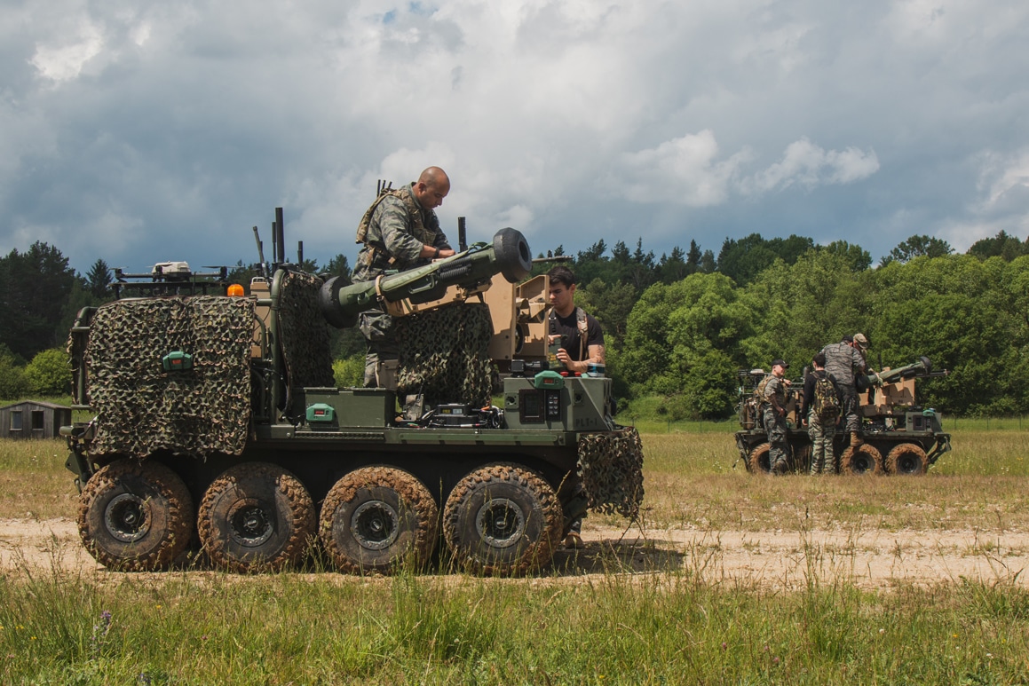 U.S. Soldiers assigned to 1st Battalion, 4th Infantry Regiment are given instruction on the use of the Project Origin robotic combat vehicle in the Hohenfels Training Area, Germany, June 6, 2022. Project Origin uses autonomous ground vehicles to support Army maneuvers by providing a variety of load packages, depending on the situation, and its use is being demonstrated during exercise Combined Resolve 17 as part of the Army's modernization and emerging technologies initiatives. Combined Resolve is a U.S. Army exercise consisting of 5,600 service members, Allies and partners from more than 10 countries, and is designed to assess units' abilities to conduct combat operations effectively in a multi-domain battlespace. (U.S. Army photo by Spc. Christian Carrillo)