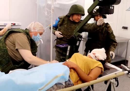 SENSITIVE MATERIAL. THIS IMAGE MAY OFFEND OR DISTURB An injured civilian receives medical treatment from Russian peacekeepers at an unknown location following the launch of a military operation by Azerbaijani forces in Nagorno-Karabakh, a region inhabited by ethnic Armenians, in this still image from video published September 20, 2023. Russian Defence Ministry/Handout via REUTERS ATTENTION EDITORS - THIS IMAGE WAS PROVIDED BY A THIRD PARTY. NO RESALES. NO ARCHIVES. MANDATORY CREDIT. WATERMARK FROM SOURCE.
