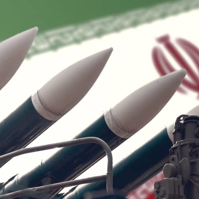 Missiles in front of Iranian flag