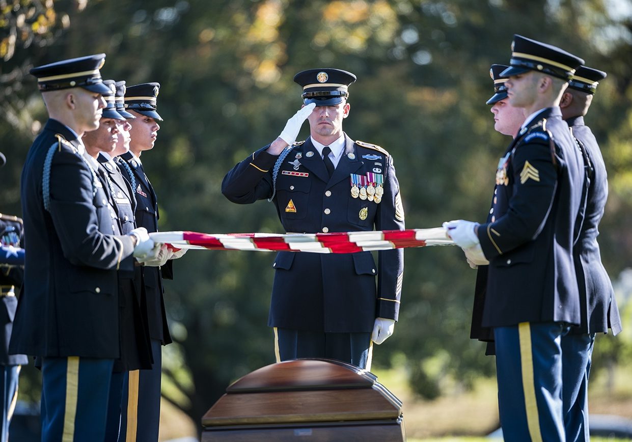 Soldiers conduct a funeral at Arlington National Cemetery