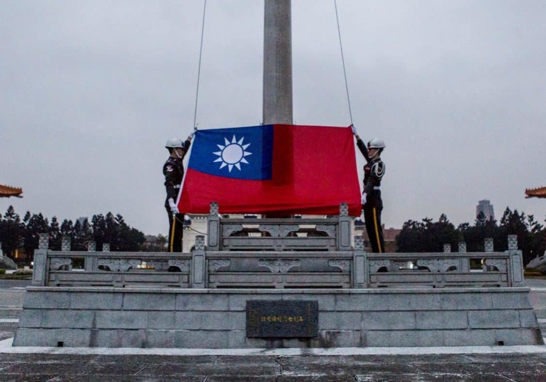 TAIPEI, TAIWAN - JANUARY 14:  Honor guards prepare to raise the Taiwan flag in the Chiang Kai-shek Memorial Hall square, ahead of the Taiwanese presidential election on January 14, 2016 in Taipei, Taiwan. Voters in Taiwan are set to elect Tsai Ing-wen, the chairwoman of the opposition Democratic Progressive Party, to become the island's first female leader.  (Photo by Ulet Ifansasti/Getty Images)